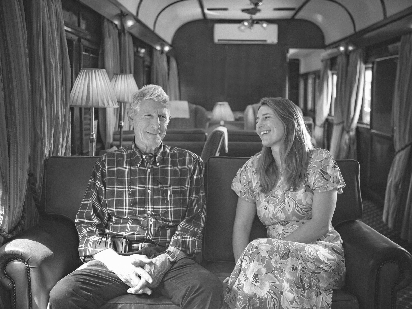 Rohan Vos and Tiffany Vos in the lounge car
